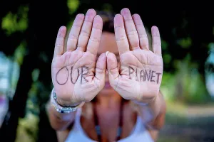 Aware Prints: Woman showing message on palms