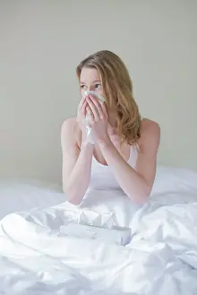 Fever Prints: Woman sick with handkerschiefs in bed