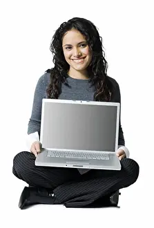 One Object Prints: Woman sitting cross legged with laptop smiling