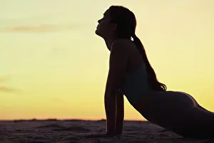Meditation Prints: Woman, stretching and silhouette at sunset on beach for yoga