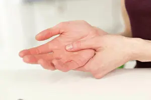 20 30 Years Prints: Woman suffering from hand pain