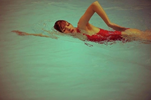 Woman swimming in pool