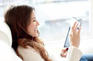 Portable Prints: Woman using a tablet computer
