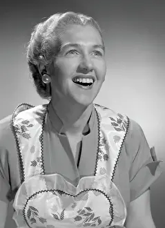 Laugh Prints: Woman wearing apron, smiling