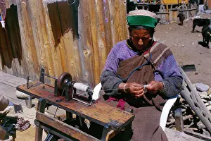 Expressions Prints: woman working on sewing machine