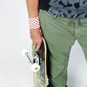 Standing Up Prints: Woman's Hand holding Skateboard