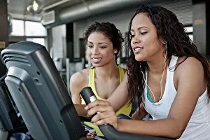 Electronic Prints: Women exercising in health club