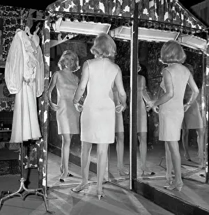 Feminity Prints: Women trying on dress