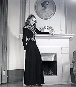Women's fashion in the 1940s. A young woman in a typical 1940s outfit