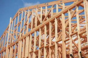Projects Prints: Wood home framing abstract at construction site