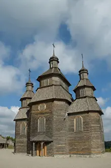 Wahrzeichen Prints: Wooden church Wooden church in old cossack village in Zaporoche