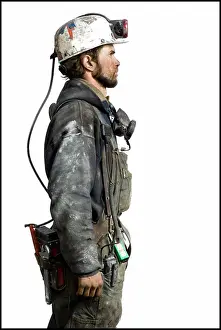 Model Release Prints: Mine worker with flashlight helmet