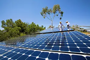 Installation Prints: Workers install a solar array on a hillside in Malibu