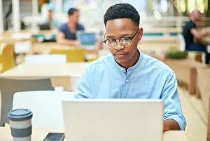 Connect Prints: Working, black man and laptop in office for research