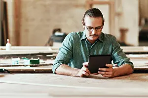 Builder Prints: Workshop, carpenter and man with tablet for reading
