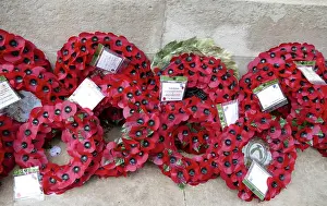 Commemoration Prints: Wreaths of artificial poppies laid in commemoration of war dead at the Cenotaph