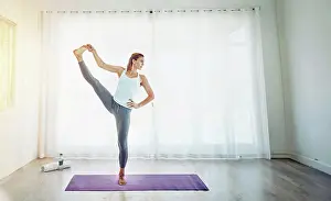 Stretch Prints: Yoga, woman and stretching leg in home on mat with balance