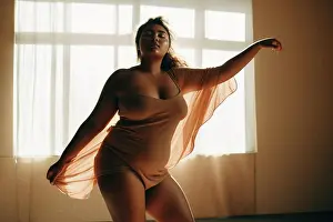 Runner Prints: Young active plus size woman dancing. AI Generative