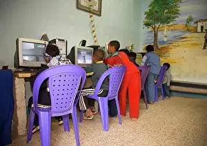 Computers Prints: Young african children playing on computers in a village in Nubia near Aswan Egypt North Africa