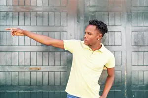 Expressive Prints: young african man pointing in a direction