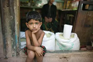 Third World Prints: Young boy, Sukrabad, outside of Dhaka, Bangladesh. (NGO Restrictions May Apply)