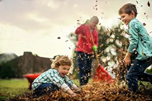 Architectural Prints: Two young boys playing in leaves