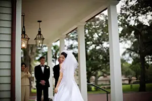 Veil Prints: Young bride looking over her shoulder