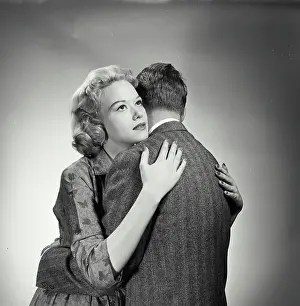 Medium Length Hair Prints: Young couple embracing each other