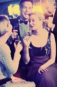 Beverage Prints: Young couple and a mature couple at a nightclub