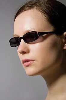 Studio Photograph Prints: Young dark-haired woman wearing sunglasses