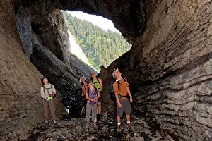 Geological Prints: Two young families explore cave on Mountain Lakes Trail near Fernie, BC, Canada