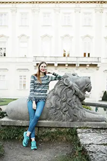 26 29 Years Old Prints: young female tourist walks the streets of Salzburg in Austria