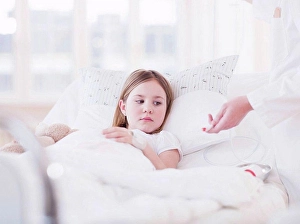 Secure Prints: A young girl with brown hair lying in bed