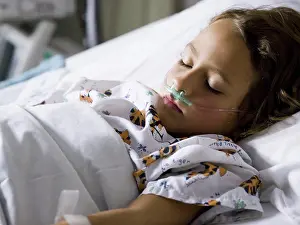Model Release Prints: Young girl in hospital bed with respirator