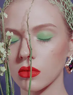 1 2 Years Old Prints: Young girl on purple. Bright makeup: red lips, green eyeshadows