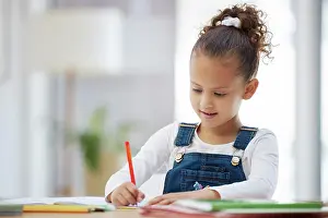 Young girl, writing and homework with book for learning