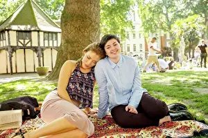 Adult Sonly Prints: A young lesbian couple enjoy the sunshine in the park