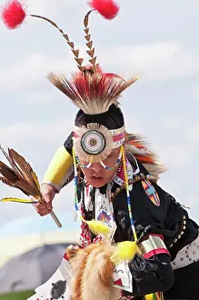 Championship Prints: Young male dancer in traditional regalia in 2nd Annual World Chicken Dance Championships