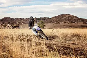 Exciting Prints: Young Man Dirt Biking in the Foothills in Colorado