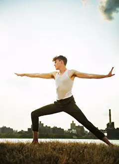 Wellness Prints: young man doing yoga in the park