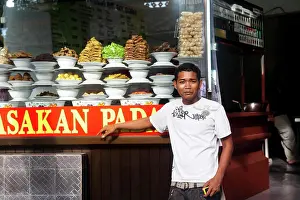 Prepared Prints: Young Man In Front Of Padang Food Display, Kuta, Bali, Indonesia