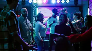 Electronics Prints: Young partners dancing together at club