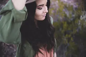 Life Styles Prints: A young person, a girl with long black hair in a green shirt