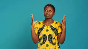 Wear Prints: Young positive woman praying to God for health and happiness