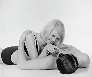 Lying On Back Prints: Young semi-dress couple lying on floor