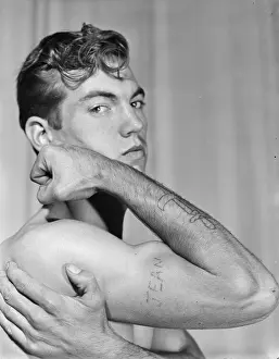 Muscular Prints: Young Shirtless Muscular Tattooed Male c.1951