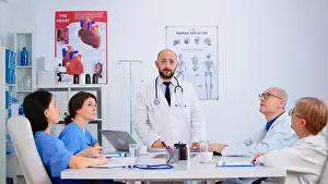 Notes Prints: Young specialist doctor explaining diagnosis for patients treatment issues record