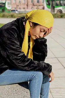 Bald Prints: Young woman with cancer undergoing treatment