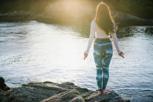 26 29 Years Old Prints: Young Woman doing Yoga on the rocks at Golden Hour