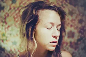 Lonely Prints: Young Woman With EReleases Closed, Portrait